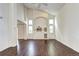 Large living room with vaulted ceilings, recessed lighting, and hardwood floors at 1438 Stockton Dr, Erie, CO 80516