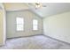 Large main bedroom features a vaulted ceiling and windows that provide natural light at 1438 Stockton Dr, Erie, CO 80516