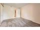 Spacious carpeted bedroom with a large closet and ensuite bathroom access at 1648 S Cole St # A2, Lakewood, CO 80228