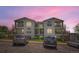 Inviting condo complex featuring private balconies and well-maintained landscaping at 1648 S Cole St # A2, Lakewood, CO 80228