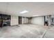 Spacious parking garage features ample room for vehicles, along with additional storage and clearly marked spaces at 1648 S Cole St # A2, Lakewood, CO 80228