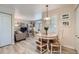 Inviting living room with wood floors, modern lighting, and comfortable seating at 1648 S Cole St # A2, Lakewood, CO 80228