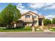 Charming two-story home with landscaped front yard and inviting entrance at 5773 S Benton Way, Littleton, CO 80123