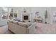 Comfortable living room with a fireplace, large windows, and stylish furnishings at 5773 S Benton Way, Littleton, CO 80123
