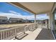 Covered back porch with views of the surrounding neighborhood at 651 Scrubjay Cir, Castle Rock, CO 80104