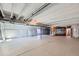 Spacious unfinished basement with a white ceiling, bare concrete floor, and insulated walls at 651 Scrubjay Cir, Castle Rock, CO 80104