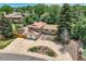 Beautiful aerial shot showcasing mature trees and a large driveway at 2380 W 105Th Pl, Northglenn, CO 80234