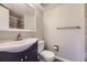 Modern bathroom with stylish vanity, toilet, and mirror at 2380 W 105Th Pl, Northglenn, CO 80234