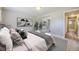 Stylish bedroom featuring a mirrored closet and neutral decor for a bright and airy ambiance at 2380 W 105Th Pl, Northglenn, CO 80234