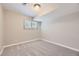 Bright, carpeted bedroom with a window at 2380 W 105Th Pl, Northglenn, CO 80234