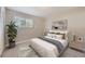 Cozy bedroom with plush carpet flooring, providing a relaxing retreat filled with natural light at 2380 W 105Th Pl, Northglenn, CO 80234