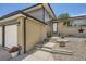Well-maintained home entrance with decorative planters and manicured landscaping at 2380 W 105Th Pl, Northglenn, CO 80234