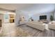 Open-concept living room with modern furnishings and neutral decor, seamlessly blending comfort and style at 2380 W 105Th Pl, Northglenn, CO 80234