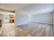 Spacious living room featuring hardwood flooring and fresh, neutral paint at 2380 W 105Th Pl, Northglenn, CO 80234