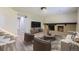 Inviting living room featuring a brick fireplace and stylish furniture, perfect for relaxing or entertaining guests at 2380 W 105Th Pl, Northglenn, CO 80234