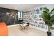 Basement playroom with vibrant wall art, chalkboard, and a cozy window nook at 619 S Gilpin St, Denver, CO 80209