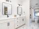 Bright bathroom featuring tile flooring, double vanity, and a shower tub at 619 S Gilpin St, Denver, CO 80209