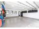 Spacious and well-lit garage with ample storage, ideal for parking and organizing equipment at 619 S Gilpin St, Denver, CO 80209