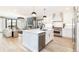 Modern kitchen connects with living room in this open concept living space at 619 S Gilpin St, Denver, CO 80209