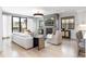 Bright living room with fireplace, modern furnishings, and large windows at 619 S Gilpin St, Denver, CO 80209
