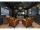 Elegant office with dark walls, floral ceiling, and leather chairs at 619 S Gilpin St, Denver, CO 80209