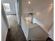 Hallway has a carpeted floor and leads to multiple rooms at 15555 E 40Th Ave # 11, Denver, CO 80239