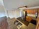 A kitchen featuring stainless steel appliances and light wood cabinets at 15555 E 40Th Ave # 11, Denver, CO 80239