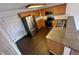 Kitchen features stainless steel appliances, countertop seating and abundant cabinet space at 15555 E 40Th Ave # 11, Denver, CO 80239
