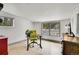 Bright office space with a desk and outdoor views at 10887 Goodheart Ave, Conifer, CO 80433