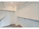 Spacious walk-in closet with ample shelving and hanging space for organized storage at 1895 York St, Denver, CO 80206