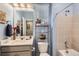 Bathroom features a vanity with a single sink, and bathtub at 8953 Falcon St, Firestone, CO 80504