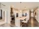 Stylish kitchen featuring a center island, stainless steel appliances, and open layout at 8953 Falcon St, Firestone, CO 80504