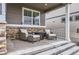 Inviting outdoor patio with comfortable seating area perfect for relaxing and entertaining at 8953 Falcon St, Firestone, CO 80504