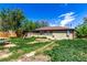 Backyard view of house and picnic table at 1151 Revere St, Aurora, CO 80011