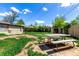 Backyard featuring lawn and picnic table at 1151 Revere St, Aurora, CO 80011
