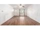 Spacious living room with hardwood floors, a ceiling fan, and lots of natural light at 1151 Revere St, Aurora, CO 80011