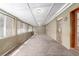 Enclosed sunroom with lots of windows and brick walls at 1151 Revere St, Aurora, CO 80011