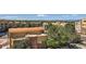 Exterior view of the community including landscaping, parking, and other low rise buildings at 9079 E Panorama Cir # 419, Englewood, CO 80112