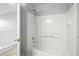 Updated bathroom featuring a shower-tub combination and classic fixtures at 1160 S Fultondale Ct, Aurora, CO 80018
