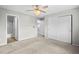 Large bedroom with two closets and access to en suite bathroom and hallway at 1160 S Fultondale Ct, Aurora, CO 80018