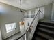 Hallway and open floorplan looking down onto the living room, staircase and kitchen at 1160 S Fultondale Ct, Aurora, CO 80018