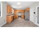 Spacious kitchen featuring wooden cabinets, modern appliances, and an open layout for entertaining at 1160 S Fultondale Ct, Aurora, CO 80018
