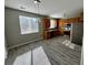 Well-lit kitchen includes stainless steel appliances, wood cabinets, and tile countertops at 1160 S Fultondale Ct, Aurora, CO 80018