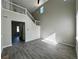 Open concept living room featuring staircase, flooring, and contemporary design at 1160 S Fultondale Ct, Aurora, CO 80018