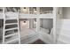 Bedroom with custom built-in bunk beds at 6995 S Ensenada St, Aurora, CO 80016