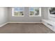 Bedroom boasts dual windows and custom built-in storage at 6995 S Ensenada St, Aurora, CO 80016