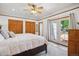 Comfortable main bedroom with access to the backyard and ample closet space at 2311 W 46Th Ave, Denver, CO 80211