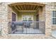 A secluded patio with brick surround, equipped with grilling appliances for outdoor entertaining at 17442 Nature Walk Trl # 105, Parker, CO 80134