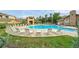 Resort-style swimming pool and deck with comfortable lounge chairs for relaxation on a sunny day at 17442 Nature Walk Trl # 105, Parker, CO 80134