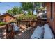 Cozy deck with comfortable outdoor furniture and wood railings, perfect for enjoying outdoor living at 669 S Washington St, Denver, CO 80209